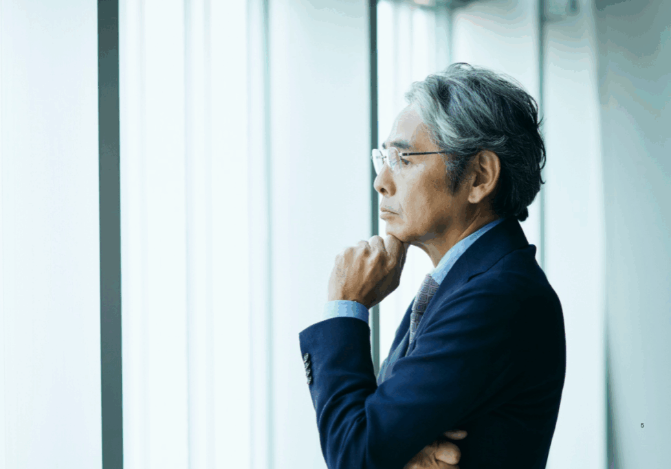 a Leader pausing to think before making a decision in the age of AI, leadership discernment